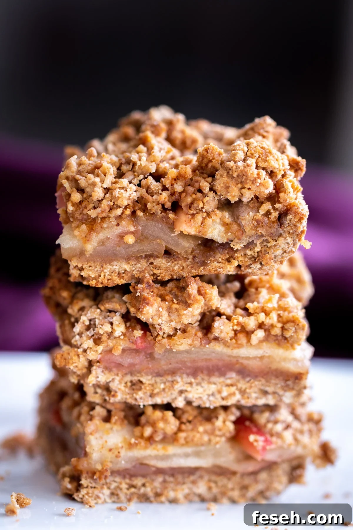 Vegan Apple Pie Bars with Cinnamon Streusel 2 a stack of vegan apple pie crumble bars