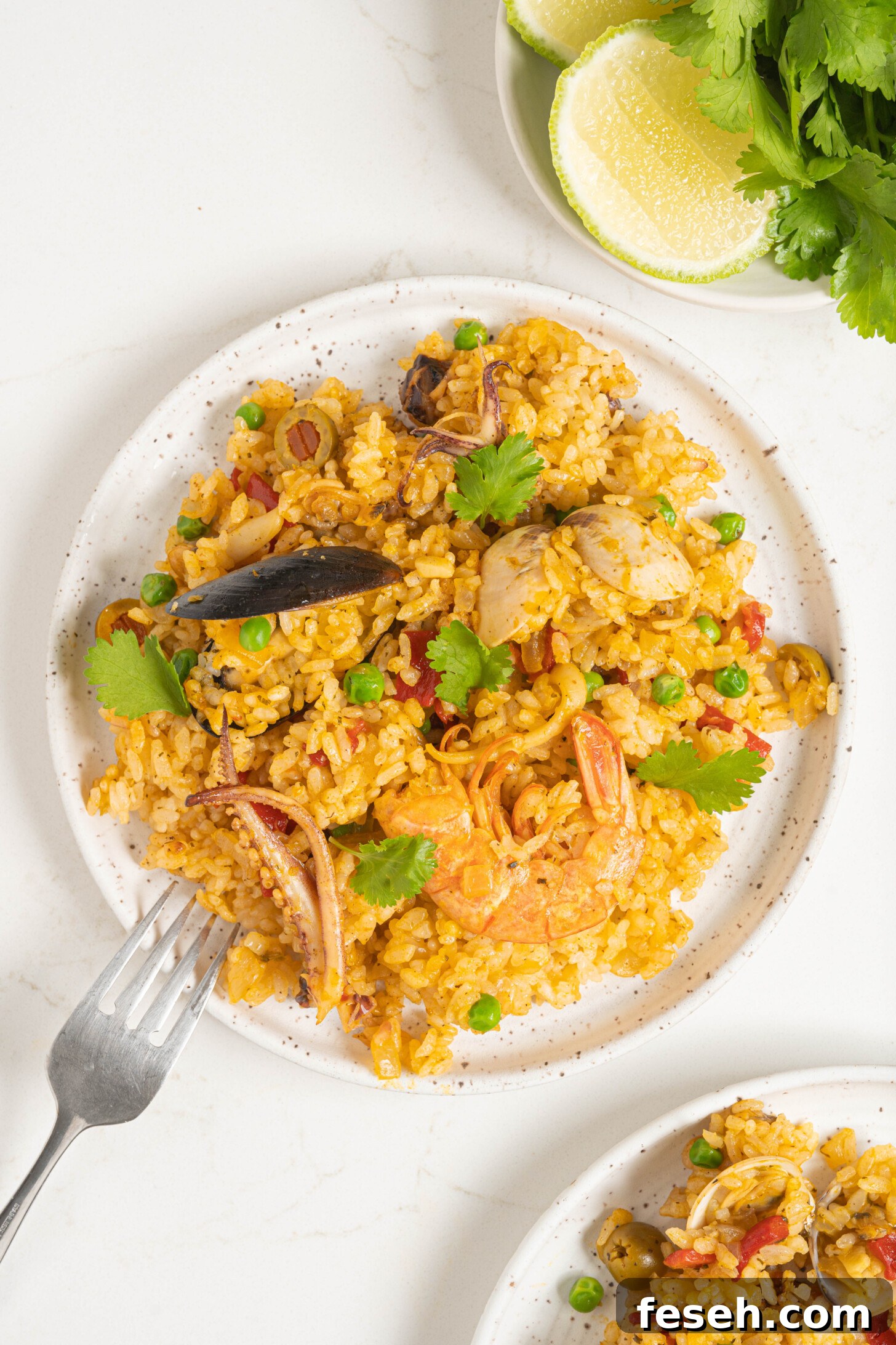 Puerto Rican Arroz con Mariscos Recipe - Authentic Seafood Rice 12 A plate of Puerto Rican seafood rice.