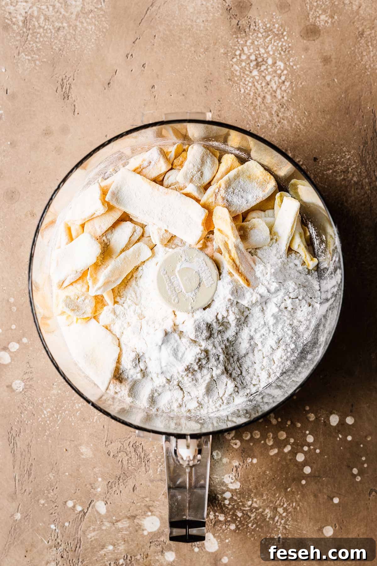Tropical Mango Cookies with Coconut Glaze 4 Freeze dried mangos, flour and leaveners before processing in a food processor bowl.