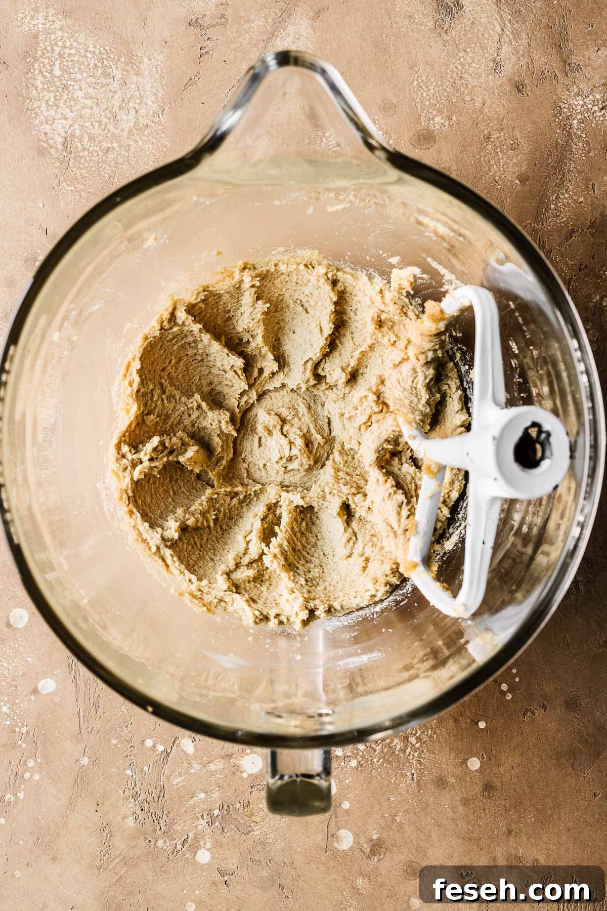 Tropical Mango Cookies with Coconut Glaze 7 Creamed butter and sugar in a clear glass mixing bowl.